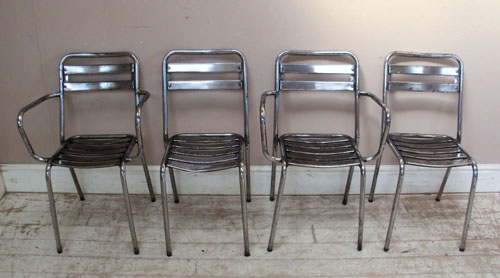 set of 4 polished steel chairs